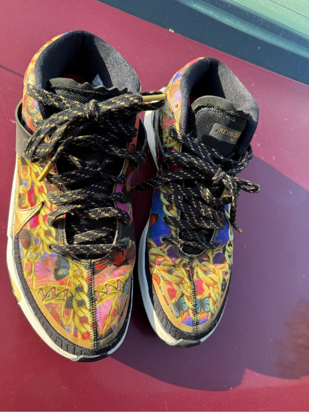 Colorful High-Top Sneakers with Gold Swoosh